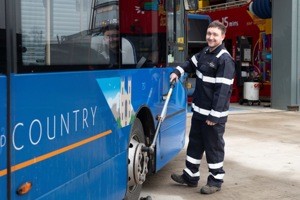 an engineer working on a bus for Transdev UK